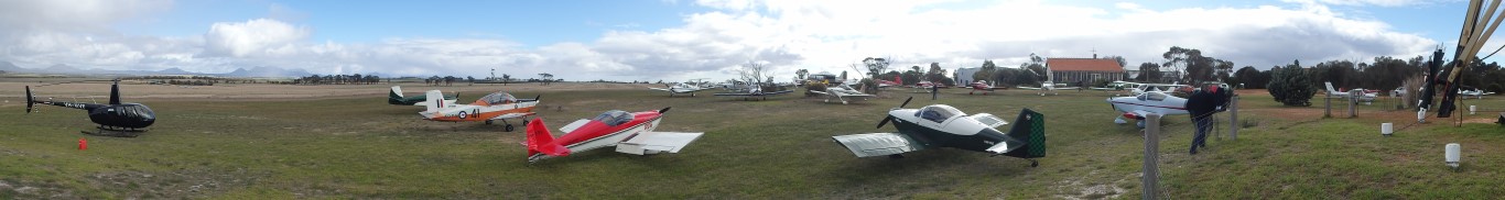 Wide angle shot showing aircraft and a helicopter.